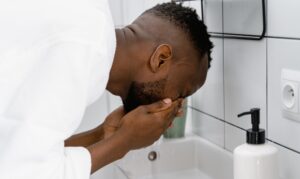Washing your face is an important part of a skincare for routine for men.