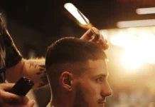 Man getting a fade haircut