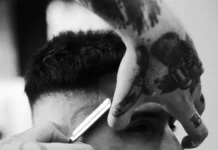Man getting a razor fade haircut