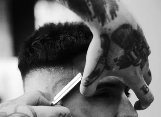 Man getting a razor fade haircut